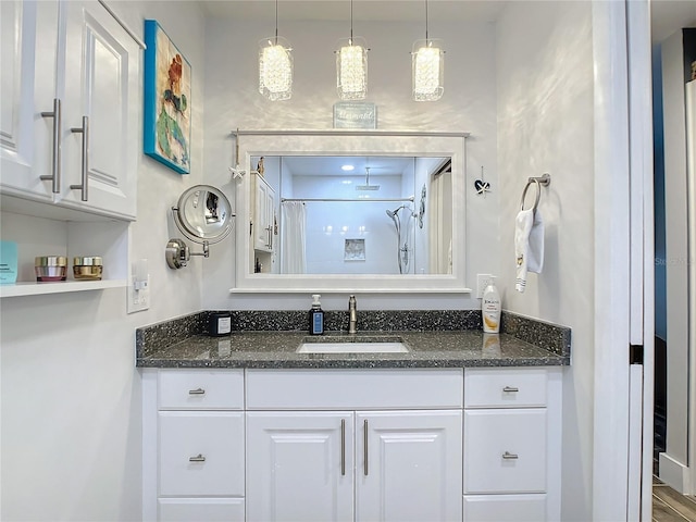 bathroom with vanity and a shower with curtain