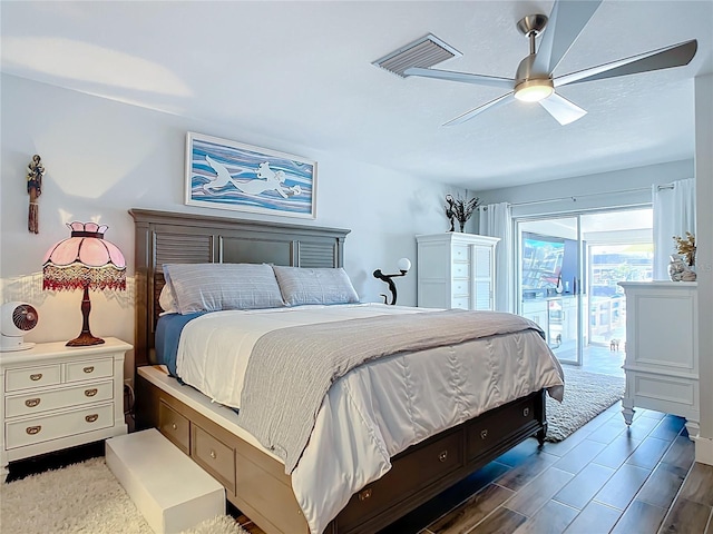 bedroom with access to exterior and ceiling fan