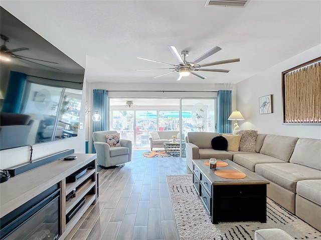 living room featuring ceiling fan