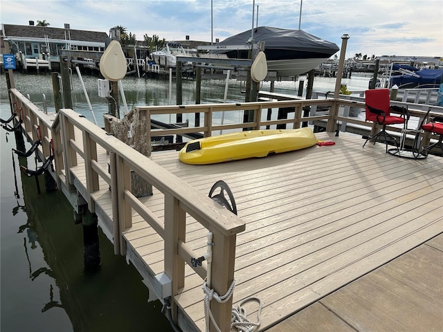 view of dock with a water view