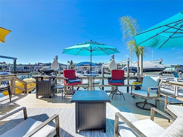 wooden deck with a water view