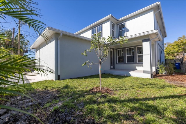 exterior space with a lawn