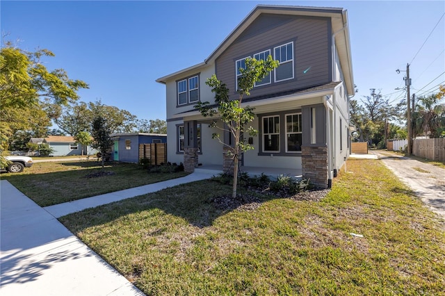 view of front of property with a front lawn