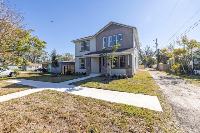 view of front of home with a front lawn