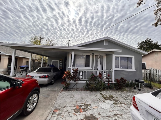 view of front of house featuring a carport