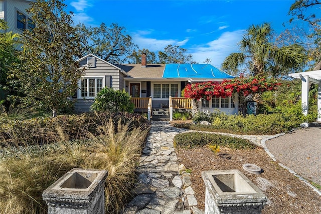 ranch-style home featuring a porch