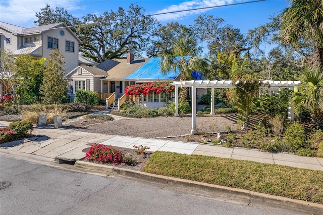 view of front of home featuring a pergola