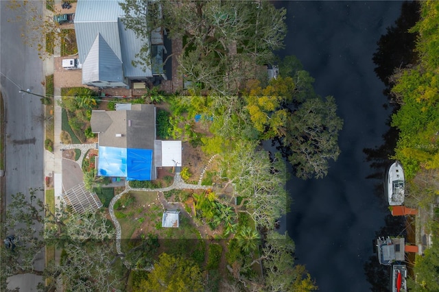 birds eye view of property featuring a water view