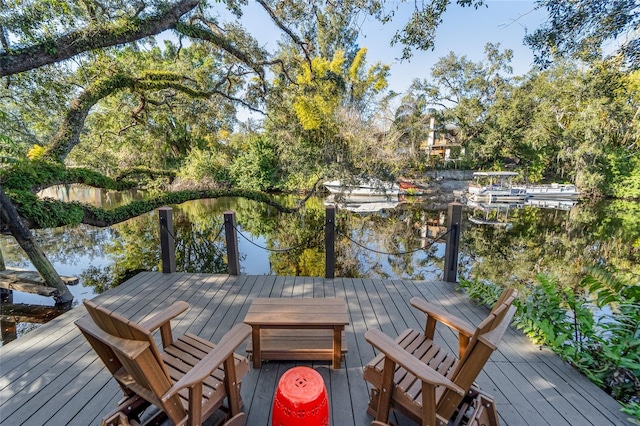 wooden terrace with a boat dock