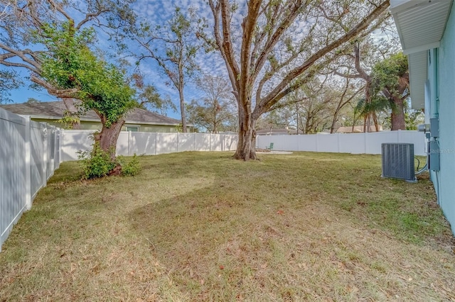 view of yard with central AC