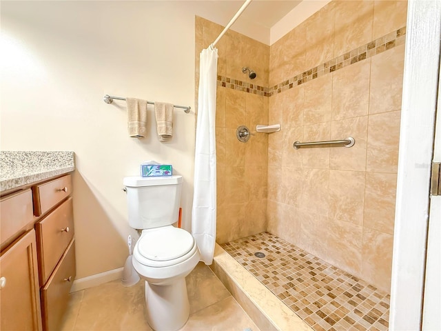 bathroom with walk in shower, vanity, toilet, and tile patterned flooring