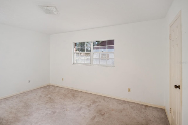 empty room with carpet flooring