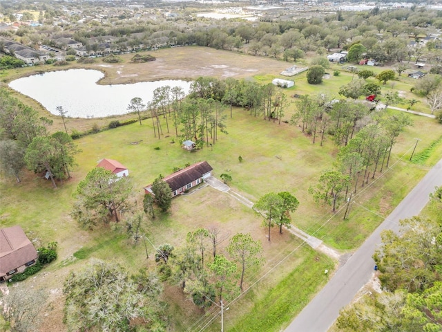 birds eye view of property with a water view and a rural view