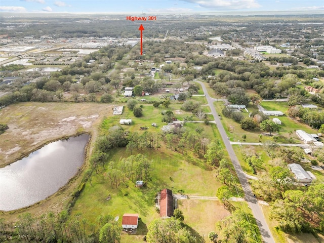 drone / aerial view with a water view