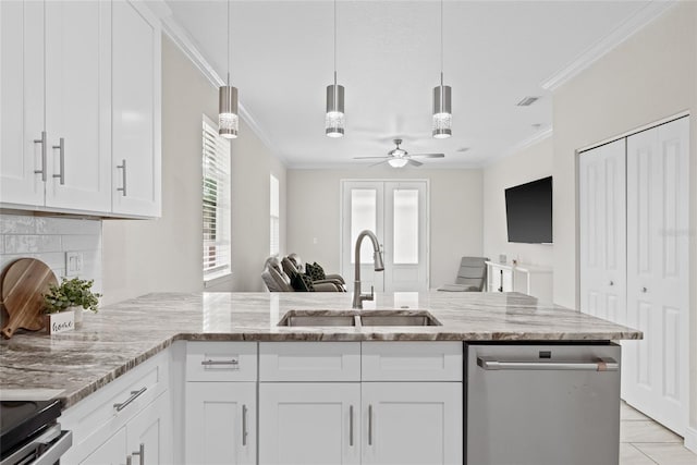 kitchen featuring white cabinets, dishwasher, and sink