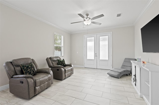 living room featuring french doors, ceiling fan, and ornamental molding