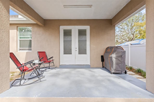 view of patio featuring area for grilling and french doors