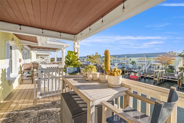 deck featuring a water view