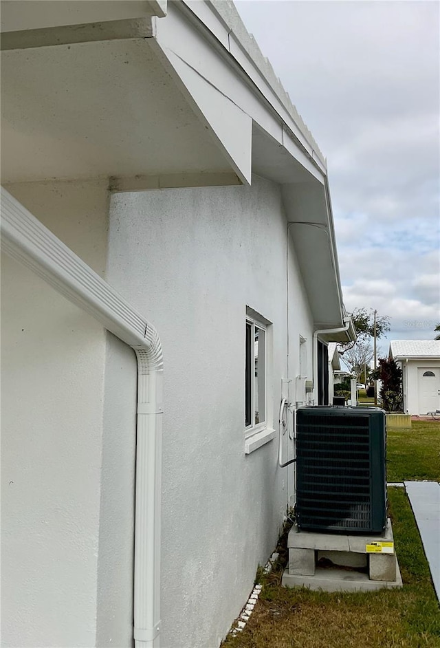 view of property exterior featuring central AC unit