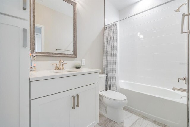 full bathroom with shower / bath combination with curtain, vanity, and toilet