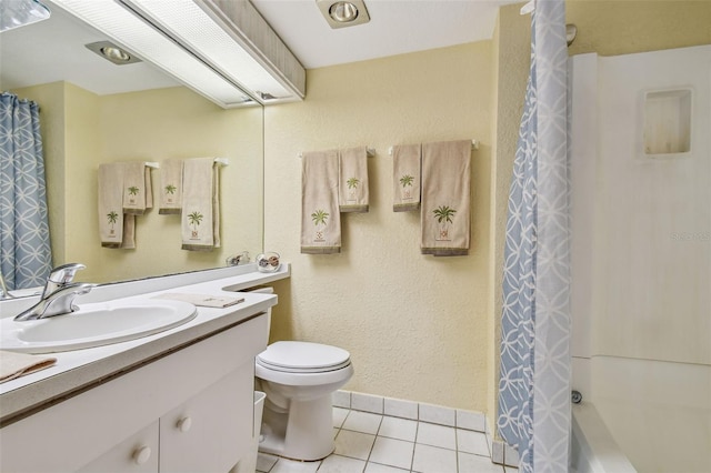 bathroom with curtained shower, toilet, vanity, and tile patterned flooring