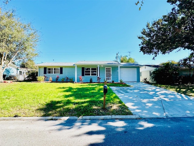 ranch-style house with a front lawn and a garage