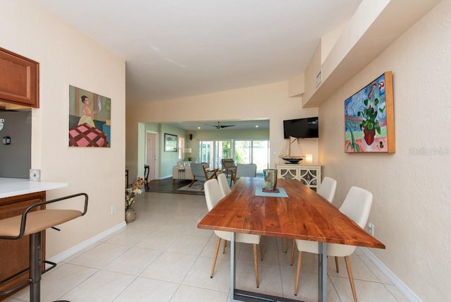 dining area with ceiling fan