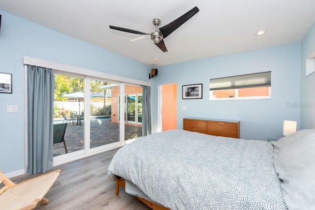 bedroom with access to exterior, ceiling fan, and light wood-type flooring