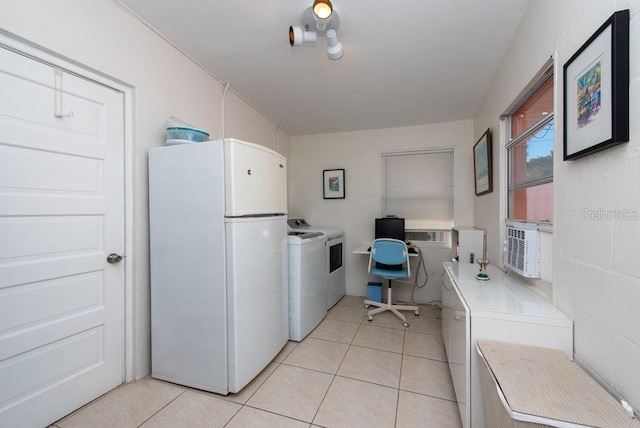 clothes washing area featuring independent washer and dryer, light tile patterned floors, and cooling unit