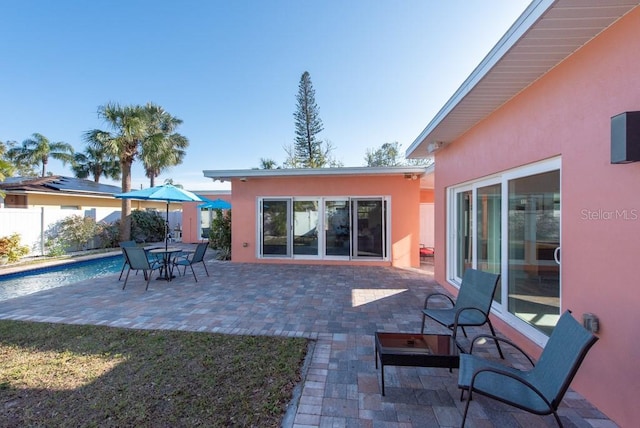 rear view of property with a patio