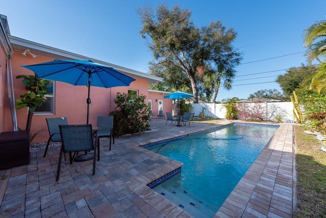 view of pool featuring a patio area