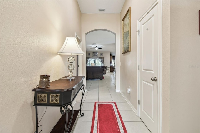 hallway with light tile patterned floors