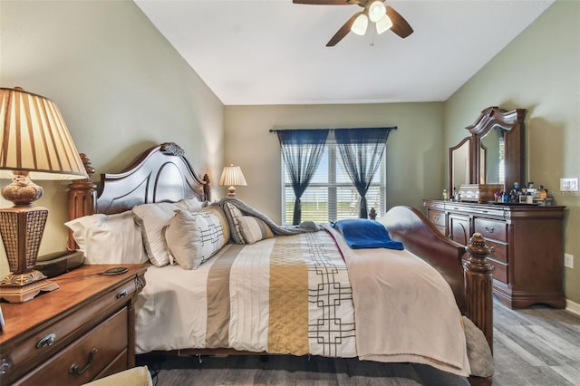 bedroom featuring ceiling fan and light wood-type flooring