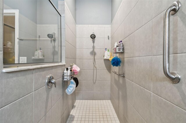 bathroom with a tile shower