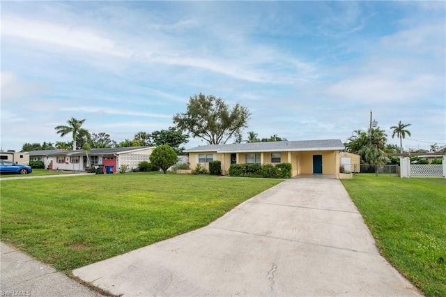 ranch-style home with a front yard