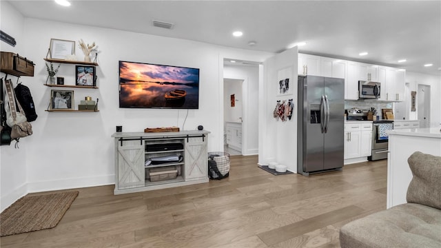 living room featuring light wood-type flooring