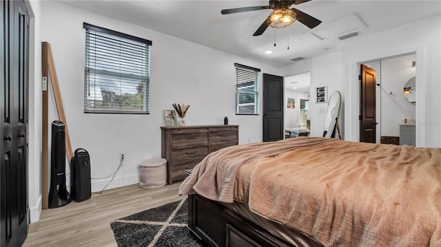 bedroom with ceiling fan and light hardwood / wood-style flooring