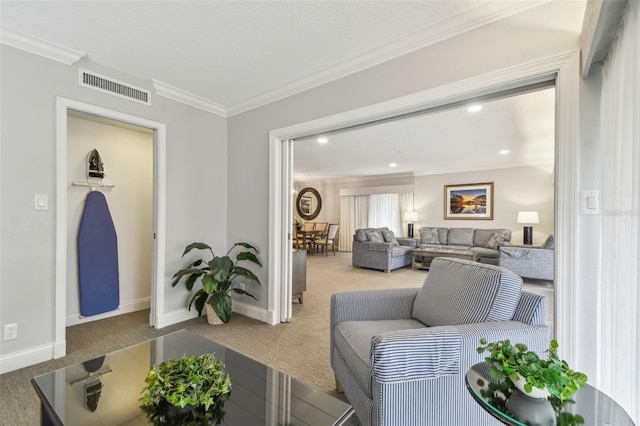 living room with carpet flooring and ornamental molding