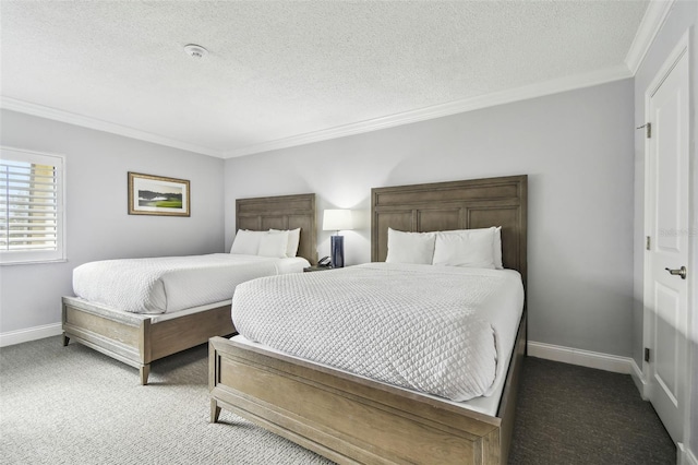 carpeted bedroom featuring ornamental molding and a textured ceiling