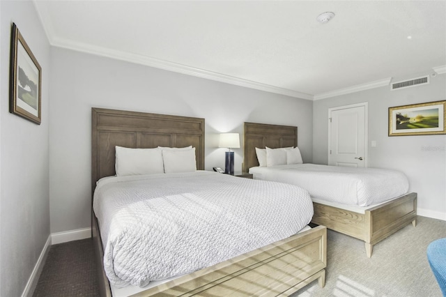 carpeted bedroom featuring crown molding