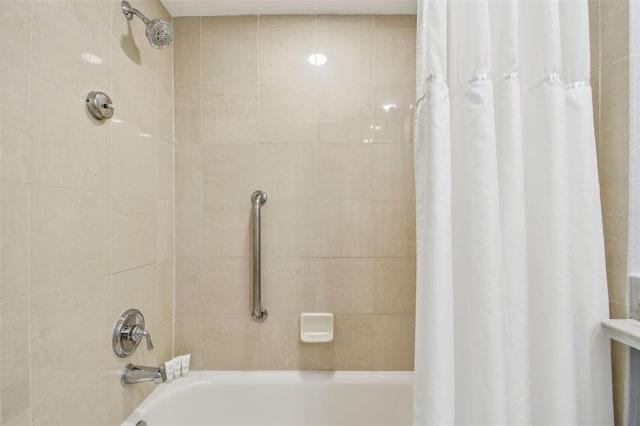 bathroom featuring shower / tub combo with curtain