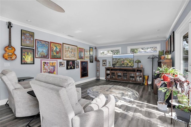 living room with crown molding, dark wood-type flooring, and a wealth of natural light