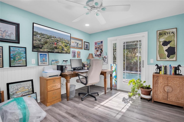 office area with ceiling fan and light wood-type flooring