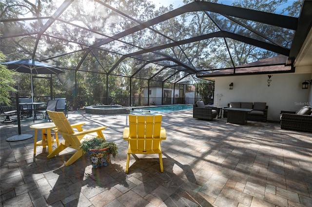 view of patio with outdoor lounge area, a swimming pool with hot tub, and a lanai