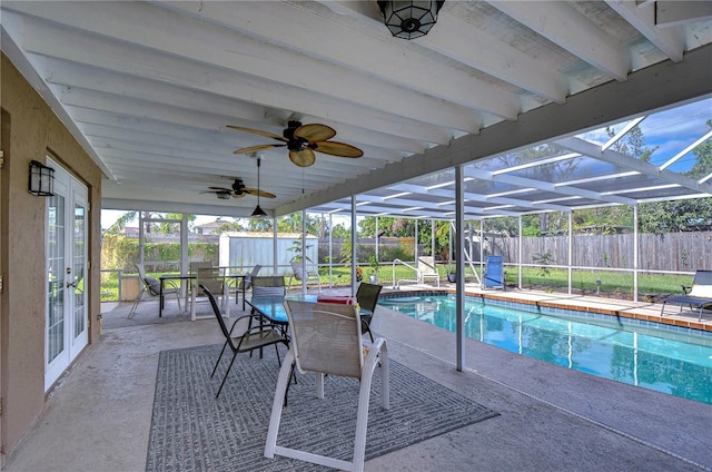 view of pool with a lanai and a patio