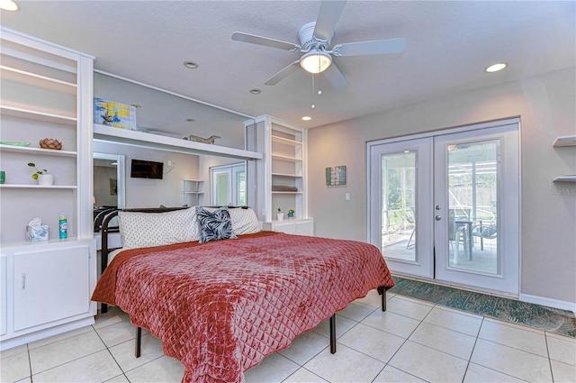 tiled bedroom featuring ceiling fan, access to outside, and french doors