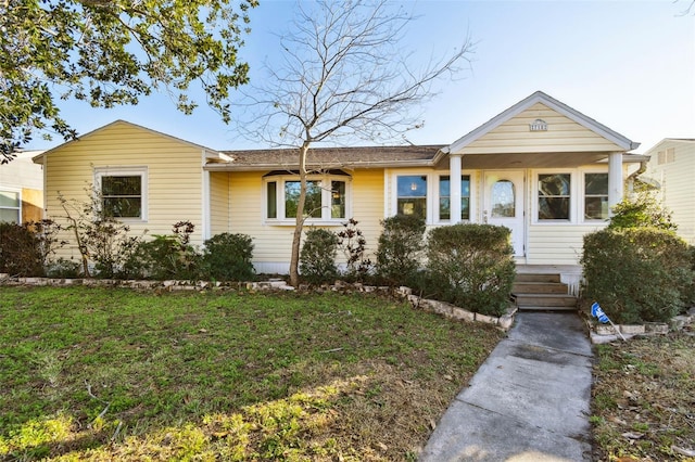 ranch-style house with a front yard