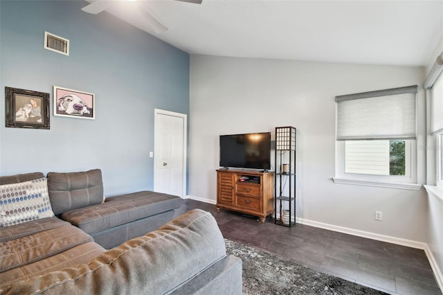 living room featuring ceiling fan and high vaulted ceiling