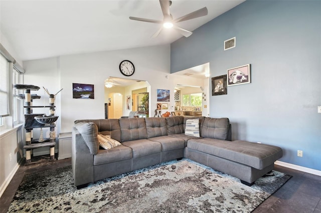 living room with vaulted ceiling and ceiling fan