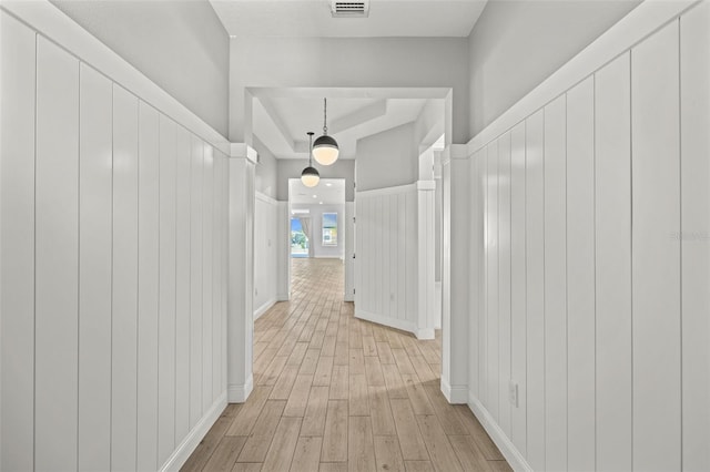 hall with light wood-type flooring